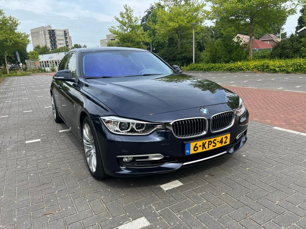 BMW 3-Serie 320i (f30) 2013 Modern Line, Achterwielaandrijving, 4 cilinders, Navigatiesysteem, Blauw