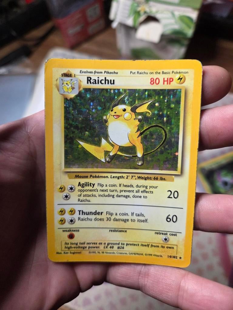 Raichu 14/102 Holo Base Set 1999 Wotc, Ophalen of Verzenden, Zo goed als nieuw, Losse kaart, Foil