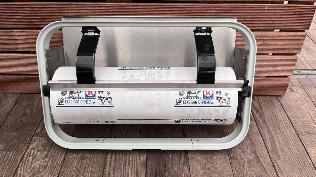 Rolhouder voor slagerspapier, Ophalen