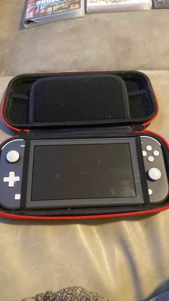 Nintendo switch light, Spelcomputers en Games, Spelcomputers | Nintendo Switch Lite, Ophalen of Verzenden, Grijs, Gebruikt
