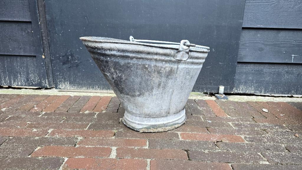 Zinken emmer, Ophalen