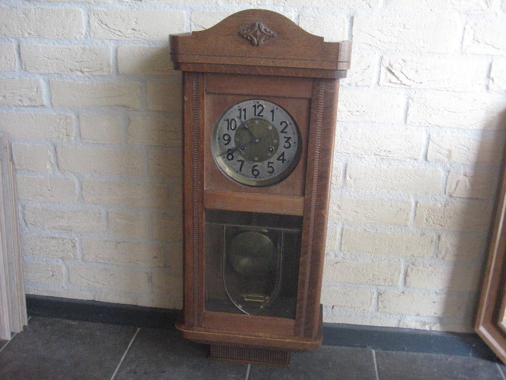 eiken wandklok, Ophalen