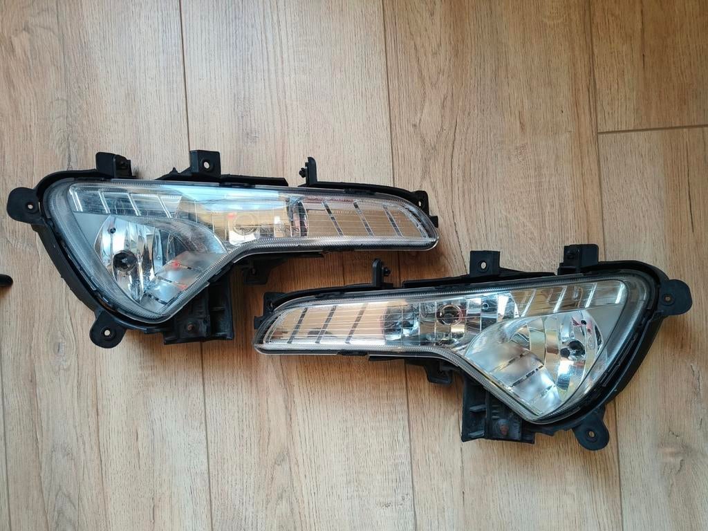 Kia Sportage 2010-2015 koplampen set links + rechts OEM, Ophalen of Verzenden, Kia