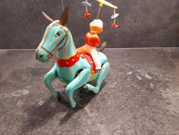 Blikken speelgoed Paard met acrobaat, Antiek en Kunst, Antiek | Speelgoed, Ophalen of Verzenden