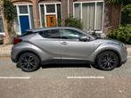 Toyota C-HR 1.8 Hybrid 122pk CVT 2019 Grijs, Auto's, 4 cilinders, Grijs, Dealer onderhouden, 1395 kg