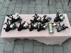 8 x shimano baitrunner molens 6500b/6500/4500 + 4 x spoel, Ophalen of Verzenden, Gebruikt, Molen