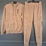 Nike Trainingspak maat XS, Kinderen en Baby's, Kinderkleding | Maat 164, Ophalen of Verzenden, Zo goed als nieuw, Setje, Nike