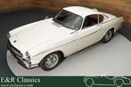 Volvo P1800 S | Gerestaureerd | Historie bekend | 1965, Auto's, Achterwielaandrijving, Zwart, 95 pk, 4 stoelen