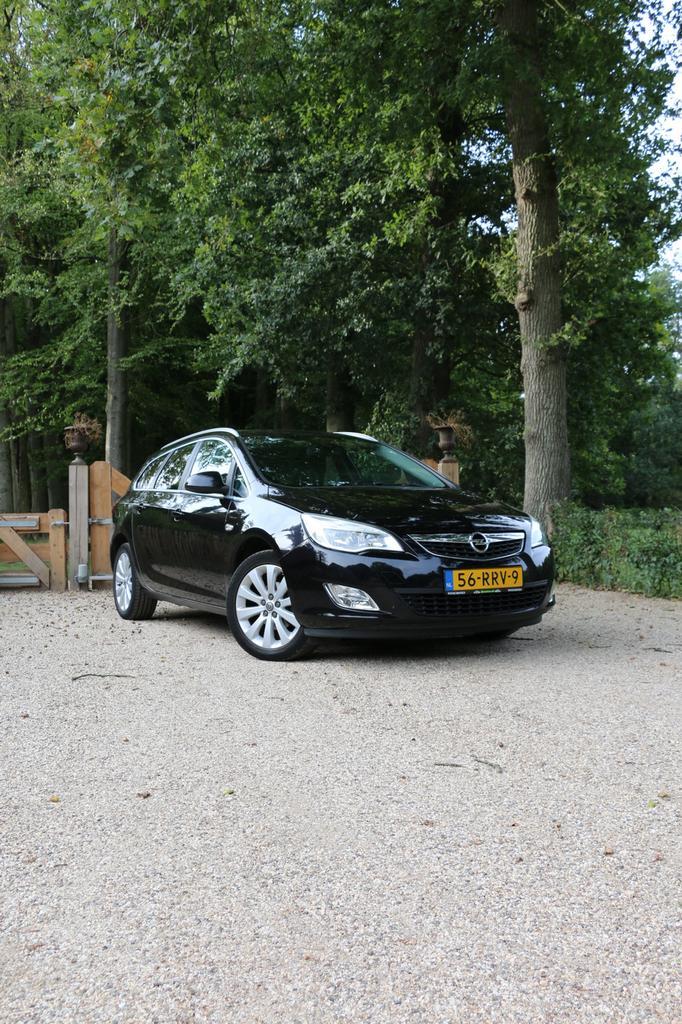 Opel Astra 1.4 74KW ST 2011 Zwart, Auto's, Opel, Particulier, Astra, Airconditioning, Centrale vergrendeling, Radio, Trekhaak