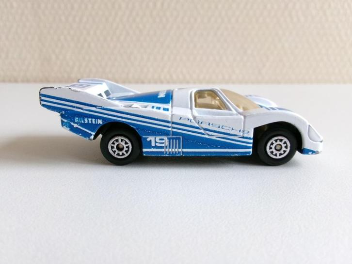 Porsche 956 wit/blauw 1:64 Edocar (geen ovp), Hobby en Vrije tijd, Modelauto's | Overige schalen, Gebruikt, Auto, Ophalen of Verzenden