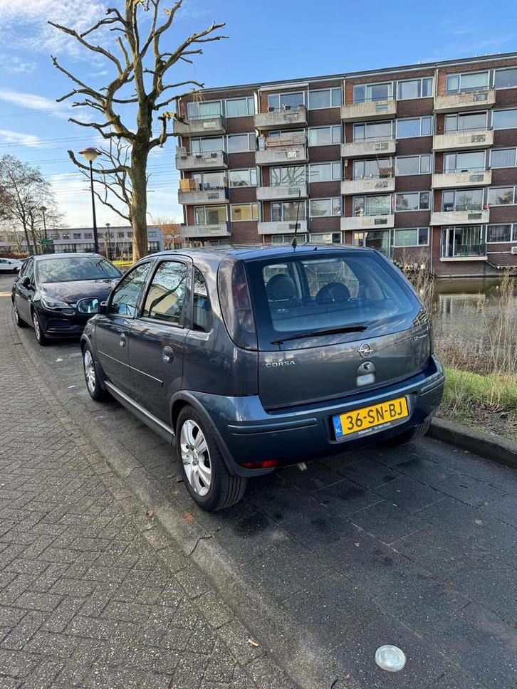 Opel Corsa 1.2 16V Twinport 5D 2006 Grijs, Auto's, Opel, Particulier, Corsa, Benzine, C, Hatchback, Handgeschakeld, Origineel Nederlands
