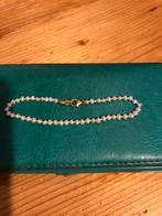 Armband met zoetwater parel en 14 krt gouden sluiting, Ophalen of Verzenden, Zo goed als nieuw, Goud