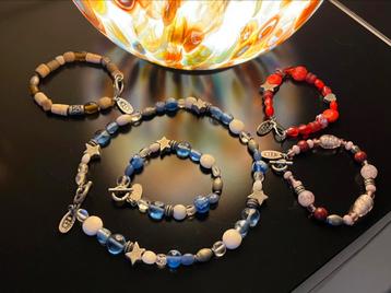 4x Symbols armbanden + 1x Symbols ketting. beschikbaar voor biedingen