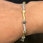 14k gouden armband hartjes model