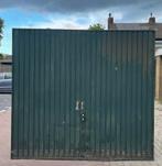Oude garagedeur met schade., Ophalen, Gebruikt, 120 cm of meer, Garagedeur
