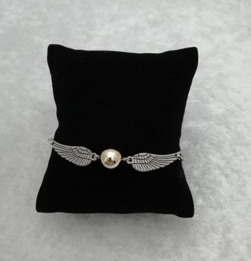 Armband zwerkbal gouden snaai zilver/goudkleur beschikbaar voor biedingen