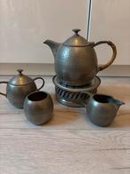 Tinnen theeservies: theepot, suikerpot, melkkan, lepeltjesho, Ophalen