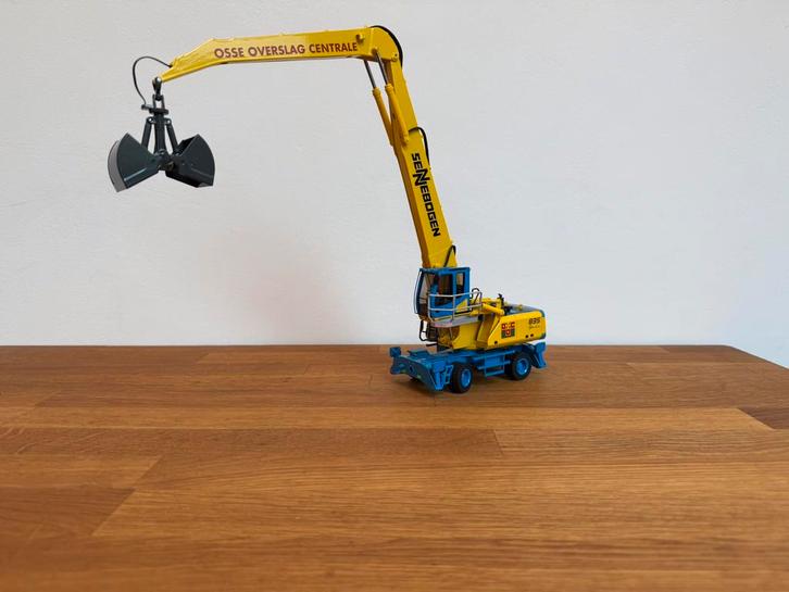 NZG Sennebogen 835M overslagkraan Osse OverslagCentrale 1:50, Hobby en Vrije tijd, Modelauto's | 1:50, Nieuw, Overige typen, NZG