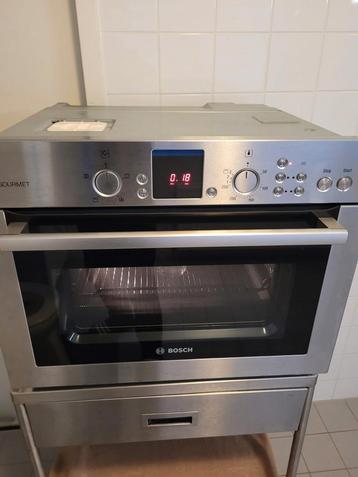 Mooie Bosch RVS combi magnetron met hetelucht oven te koop.  beschikbaar voor biedingen