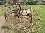 Oud hooiwenner machine, Ophalen