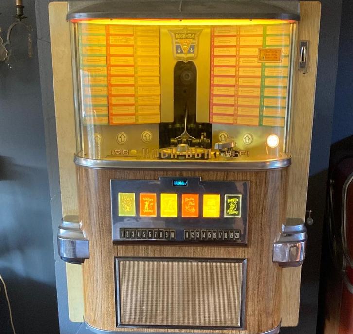 Rock-ola 1464  wandjukebox, Verzamelen, Automaten | Jukeboxen, Gebruikt, Rock Ola, 1950 tot 1960, Met singles, Ophalen