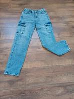leuke blauwe merk denim met zakken aan de zijkant 28, Kleding | Dames, Spijkerbroeken en Jeans, Ophalen of Verzenden, Nieuw, W28 - W29 (confectie 36)