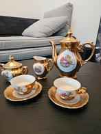 Gouden theeservies met romantische decoratie, Ophalen