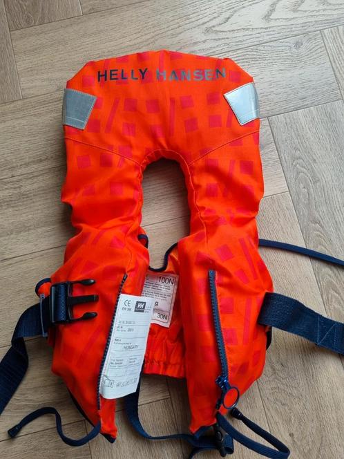 Reddingsvest kind 5-15 kg Helly Hansen, Watersport en Boten, Watersportkleding, Zo goed als nieuw, Reddingsvest of Zwemvest, Kind