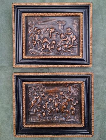 Paar reliëfjes van koper putto putti, 19e eeuw. beschikbaar voor biedingen