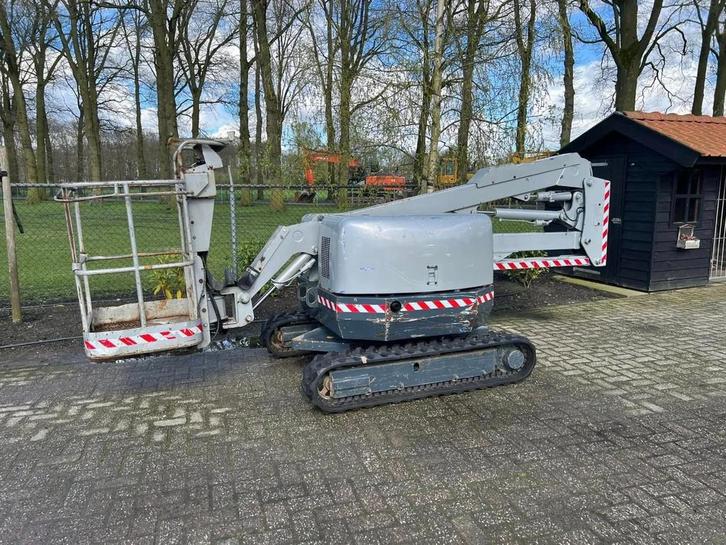 Maeda nagano NUL060-2 rupsHoogwerker diesel CE, Zakelijke goederen, Machines en Bouw | Liften, Steigers en Ladders