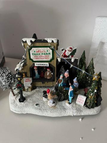 Diversieteit aan kerstspulletjes voor dorpje beschikbaar voor biedingen