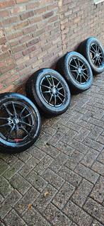 Winterbanden met aluminium velgen (zwart) 195/65 R15, Ophalen, Gebruikt, 15 inch, Banden en Velgen