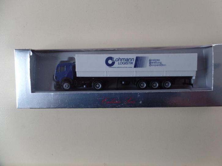 Mercedes trekker / oplegger   Lohmann Logistik Herpa, Hobby en Vrije tijd, Modelauto's | 1:87, Nieuw, Bus of Vrachtwagen, Herpa