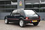 Peugeot 205 1.9 GTI (bj 1991), Auto's, Voorwielaandrijving, Metallic lak, Zwart, Leder en Stof