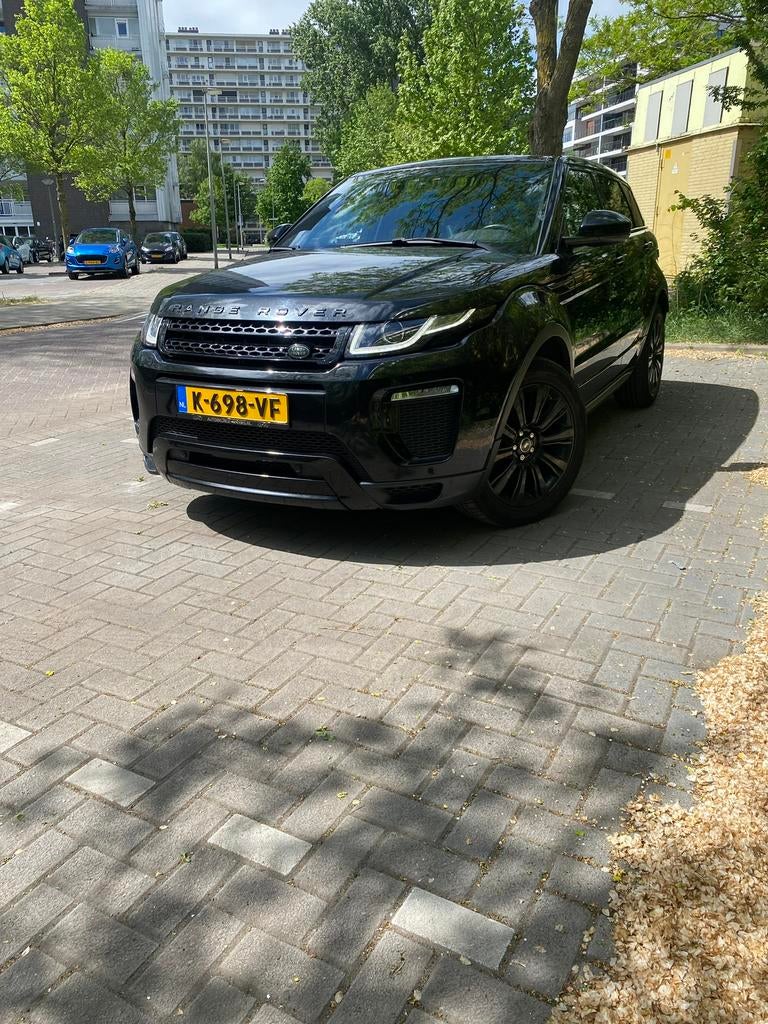 Land Rover Range Rover Evoque 2.0 TD4 4WD AUT 2015 Zwart, Auto's, Automaat, 2000 kg, Zwart, Diesel