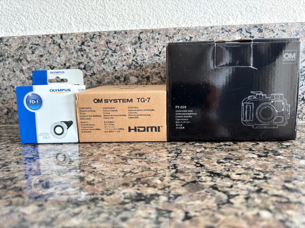 OM System Tough TG-7 rood + PT-059 onderwaterhuis, Audio, Tv en Foto, Fotocamera's Digitaal, Compact, Ophalen of Verzenden, Zo goed als nieuw