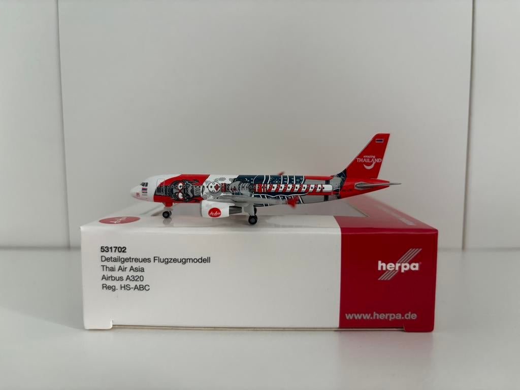 Herpa 531702 Thai Air Asia Airbus A320 1:500, Ophalen of Verzenden, Zo goed als nieuw, Schaalmodel