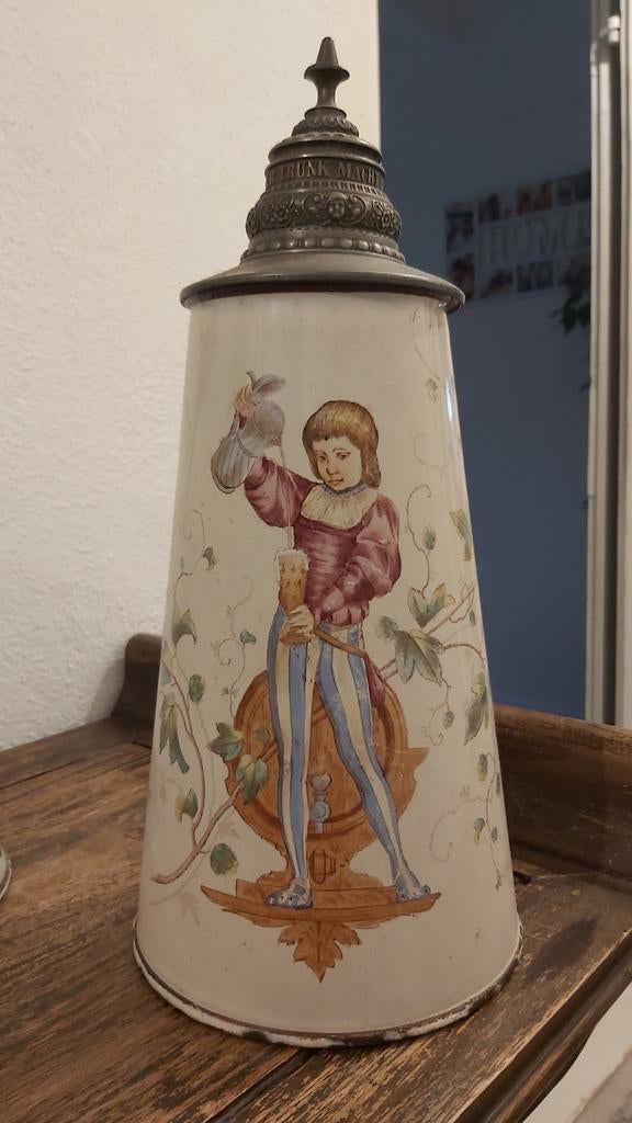 Grote bierkan met tinnendeksel, Ophalen