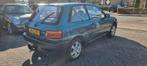 Toyota Starlet 1.3 XLi, Auto's, Stof, Zwart, 4 cilinders, Origineel Nederlands