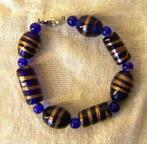 armband blauw met blauwe kraaltjes, 19 cm lang,, Ophalen of Verzenden, Nieuw, Blauw, Overige materialen