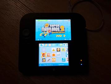 Nintendo 2DS in zwart/blauwe uitvoering met game.  beschikbaar voor biedingen