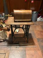Oude Singer naaimachine, Ophalen
