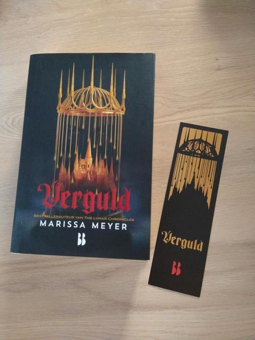 Marissa Meyer - Verguld, Boeken, Fantasy, Zo goed als nieuw, Ophalen of Verzenden
