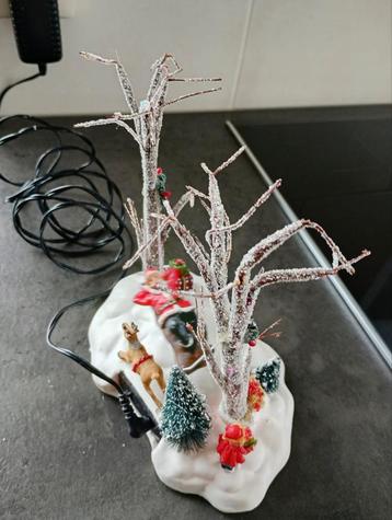 Kerstman schommelend in hangmat beschikbaar voor biedingen