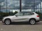 Bmw X1 xDrive20i Aut - Pano, Prof navi, Auto's, BMW, Gebruikt, Euro 6, 4 cilinders, Beige