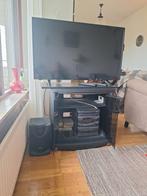 TV meubel met TV en stereo installatie, Ophalen