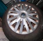 Winterbanden VW 195/65 R15 met velgen en wieldoppen, Ophalen of Verzenden, Gebruikt