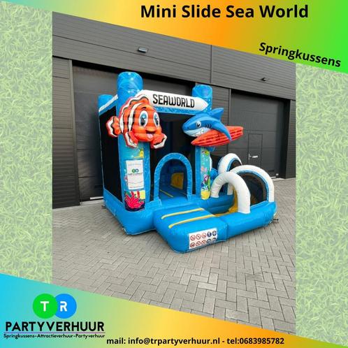 Springkussen Mini Slide Sea World te huur (Regio Nijmegen), Hobby en Vrije tijd, Feestartikelen | Verhuur, Zo goed als nieuw, Overige