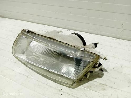 Koplamp Mitsubishi Carisma 14525900, Auto-onderdelen, Verlichting, Gebruikt, Ophalen of Verzenden