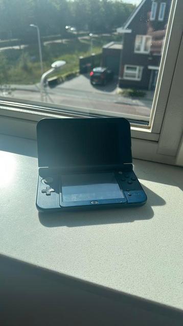 New nintendo 3DS XL + games beschikbaar voor biedingen